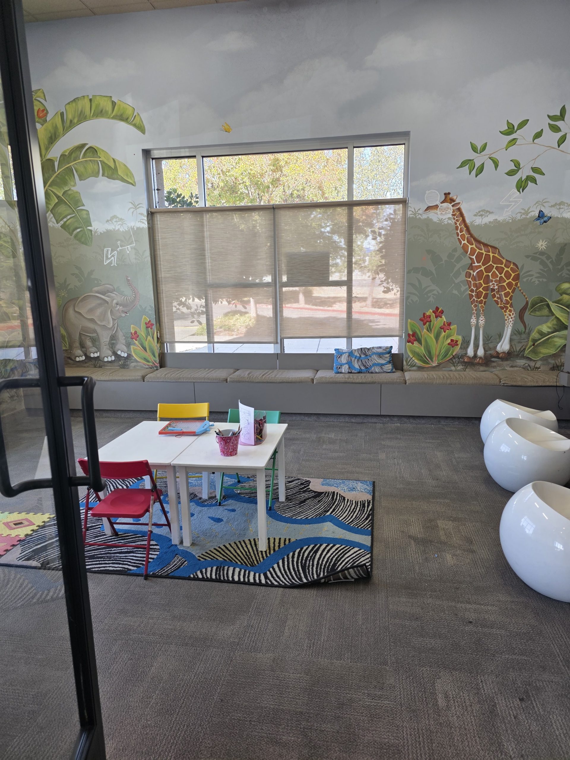 Playroom with activity area inside Kids Care Dental & Orthodontics - Calvine in Sacramento, CA