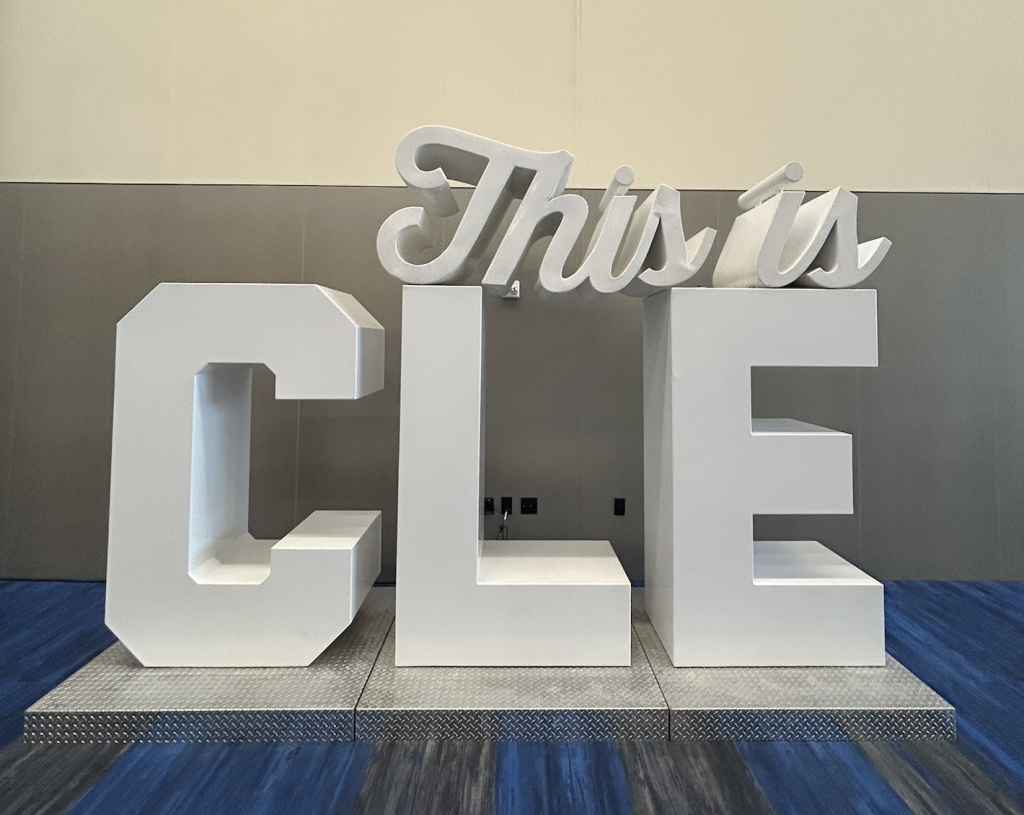 Giant white “This is CLE” letter sign on display inside the Huntington Convention Center of Cleveland during MAICON 2026