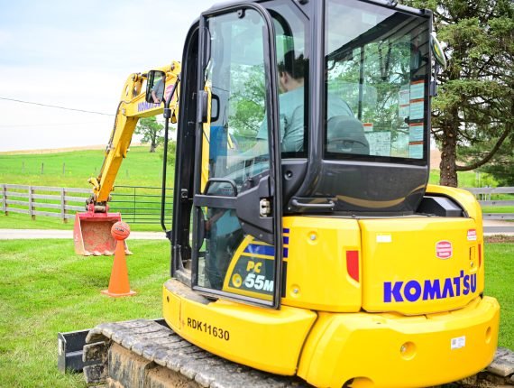landfill operators using heavy equipment